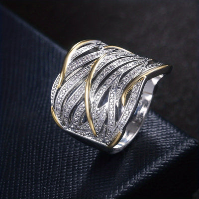 Elegant multi-layered twisted ring
