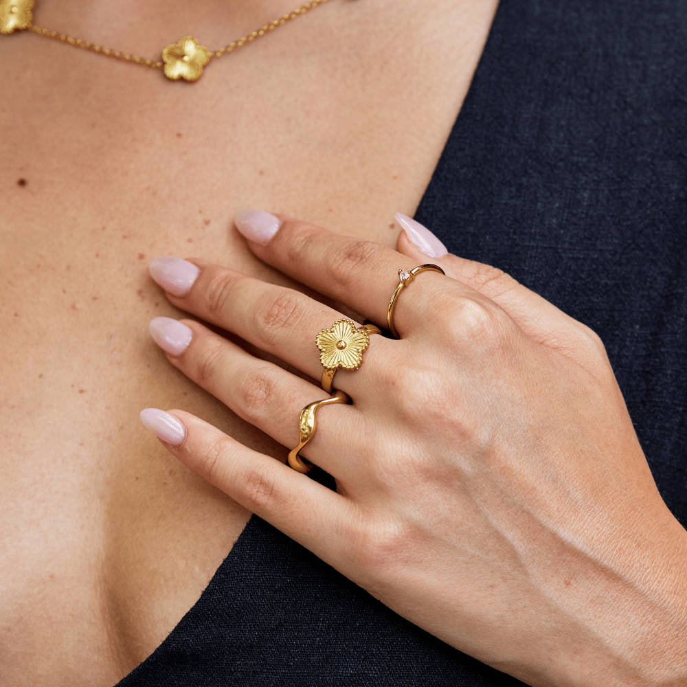 Golden clover leaf ring