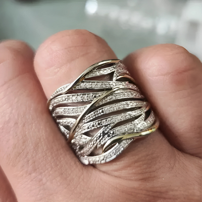 Elegant multi-layered twisted ring